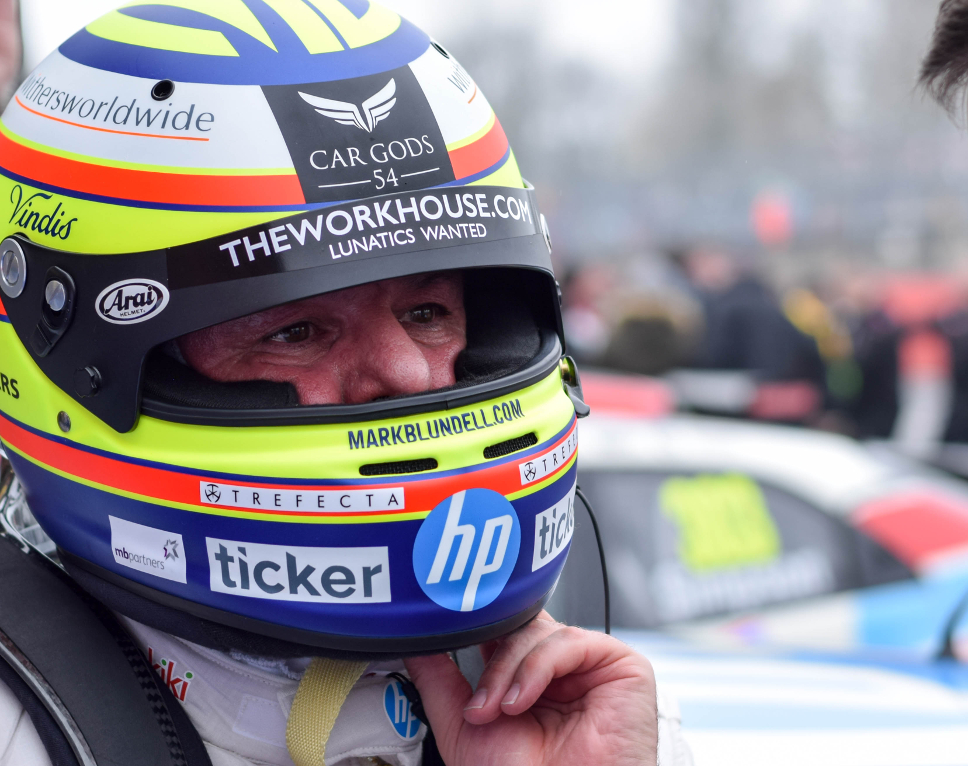 Mark Blundell's BTCC helmet featuring the Ticker logo